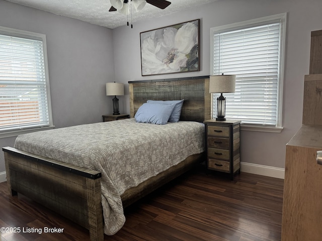 1236 Carrico Ave, Louisville, KY 40215 - bedroom with baseboards, dark wood-style floors, a textured ceiling, and ceiling fan