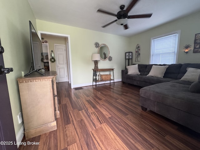 1236 Carrico Ave, Louisville, KY 40215 - living room with ceiling fan, dark wood finished floors, and baseboards