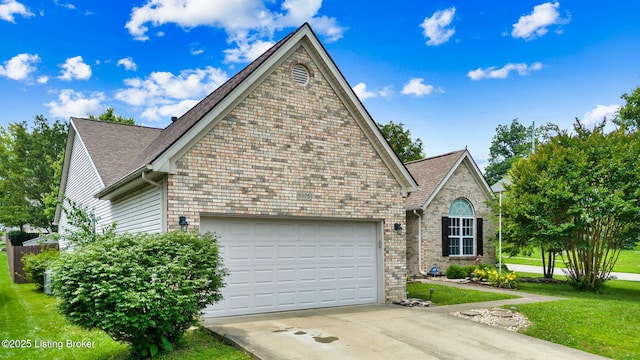 8506 Hunting Stock Pl, Louisville, KY 40291 - view of front of home featuring an attached garage, concrete driveway, a front yard, brick siding, and roof with shingles