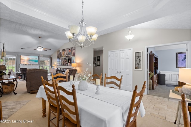8506 Hunting Stock Pl, Louisville, KY 40291 - dining room featuring lofted ceiling, a ceiling fan, a chandelier, light carpet, and ornamental molding