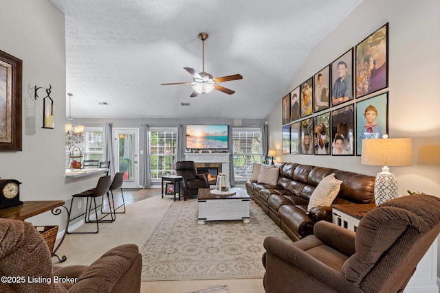 8506 Hunting Stock Pl, Louisville, KY 40291 - living area featuring ceiling fan, a glass covered fireplace, and lofted ceiling