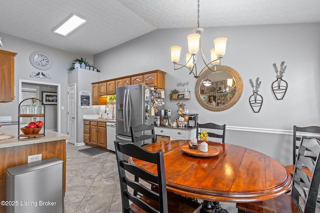 8506 Hunting Stock Pl, Louisville, KY 40291 - dining space featuring lofted ceiling, a chandelier, and a textured ceiling
