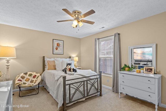 8506 Hunting Stock Pl, Louisville, KY 40291 - bedroom with light colored carpet, baseboards, a ceiling fan, and a textured ceiling
