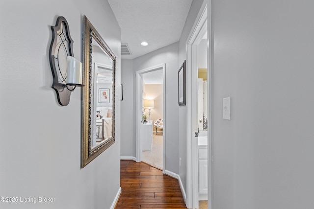 8506 Hunting Stock Pl, Louisville, KY 40291 - hallway featuring dark wood-style floors, baseboards, and recessed lighting