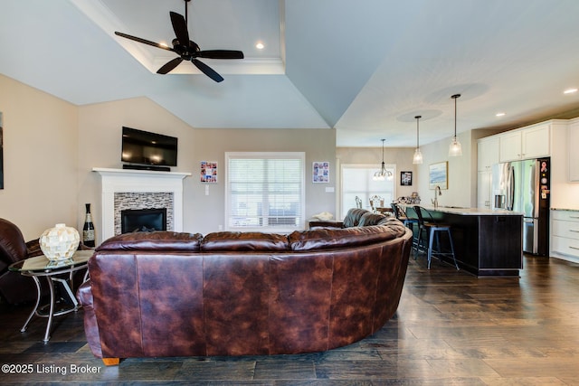 1622 Church Side Dr, Goshen, KY 40026 - living area featuring a tile fireplace, a ceiling fan, dark wood-type flooring, recessed lighting, and a raised ceiling