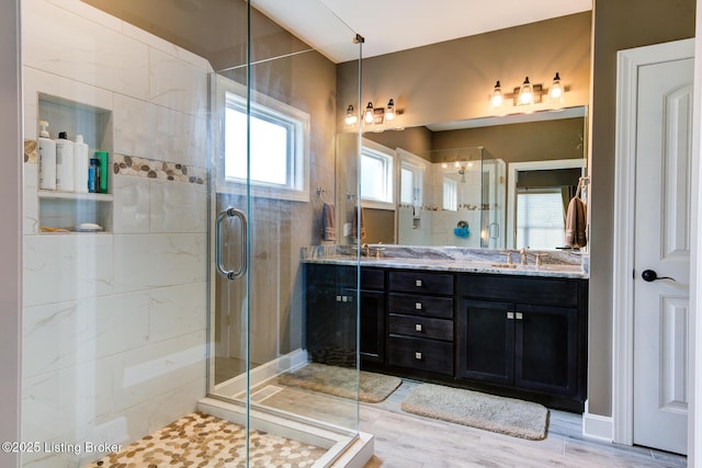 1622 Church Side Dr, Goshen, KY 40026 - bathroom featuring a shower stall, double vanity, and wood finished floors
