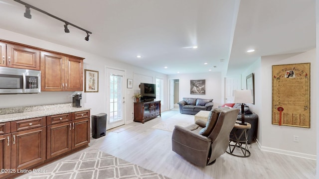150 E Laurel River Drive Rd, Shepherdsville, KY 40165 - living room with light wood-style flooring, baseboards, rail lighting, and recessed lighting