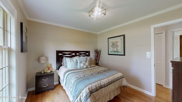 150 E Laurel River Drive Rd, Shepherdsville, KY 40165 - bedroom with light wood-type flooring, ornamental molding, and baseboards