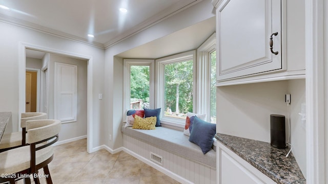 150 E Laurel River Drive Rd, Shepherdsville, KY 40165 - living area with crown molding, healthy amount of natural light, baseboards, and light tile patterned flooring
