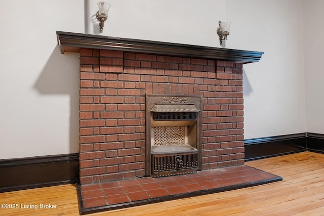 965 S Shelby St, Louisville, KY 40203 - detailed view of wood finished floors and a fireplace