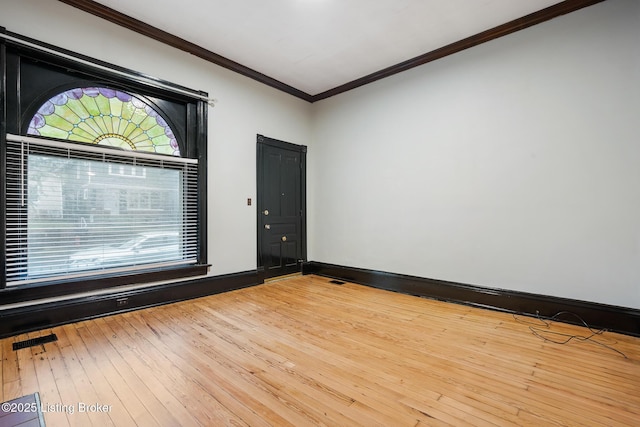 965 S Shelby St, Louisville, KY 40203 - empty room featuring plenty of natural light, ornamental molding, and wood-type flooring