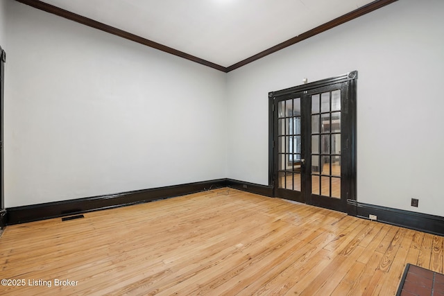 965 S Shelby St, Louisville, KY 40203 - empty room with hardwood / wood-style floors, crown molding, and baseboards