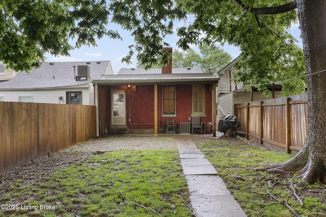 965 S Shelby St, Louisville, KY 40203 - rear view of house with a chimney and cooling unit