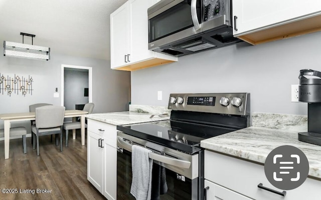 800 Lincoln Dr, Elizabethtown, KY 42701 - kitchen with appliances with stainless steel finishes, white cabinets, dark wood-type flooring, and light stone counters