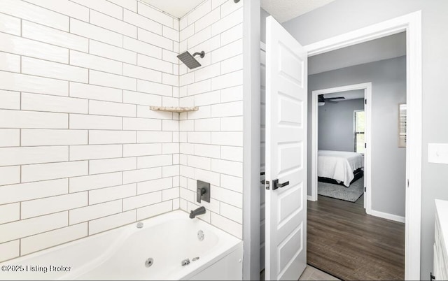 800 Lincoln Dr, Elizabethtown, KY 42701 - full bathroom featuring shower / tub combination, ensuite bath, wood finished floors, baseboards, and a ceiling fan