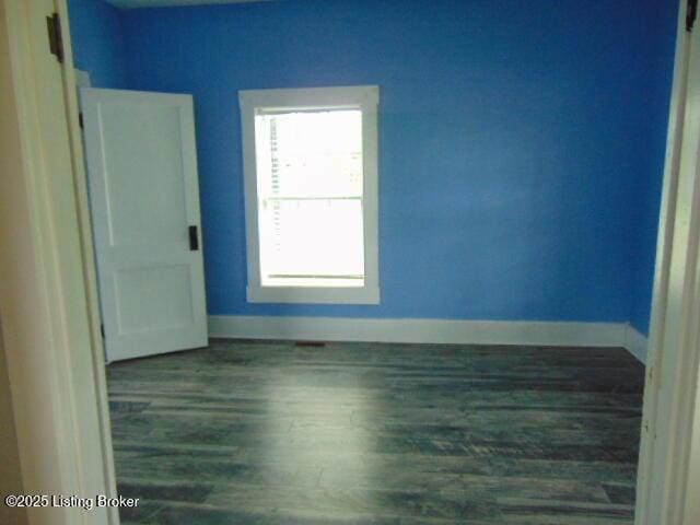 27 Alexander Ave, Bedford, KY 40006 - empty room featuring baseboards and wood finished floors