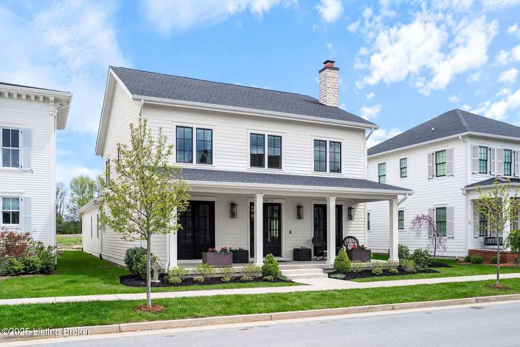11413 River Beauty Loop, Prospect, KY 40059 - view of front facade featuring covered porch, a chimney, and a front lawn