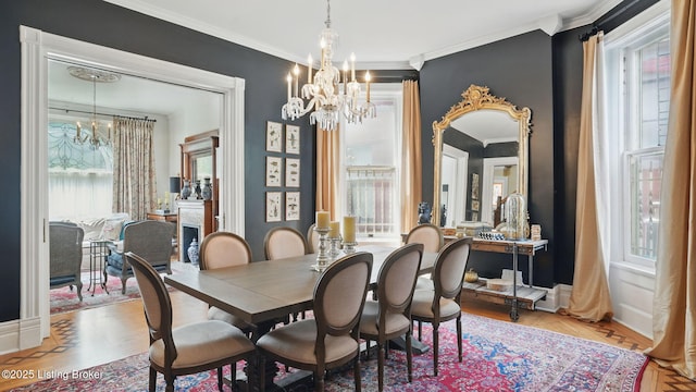 1212 S 2nd St, Louisville, KY 40203 - dining space with a chandelier and crown molding