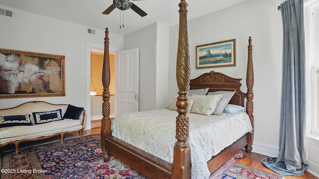 1212 S 2nd St, Louisville, KY 40203 - bedroom featuring wood finished floors and a ceiling fan