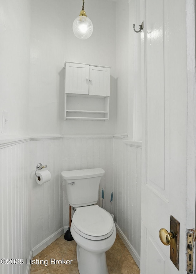1212 S 2nd St, Louisville, KY 40203 - bathroom featuring wainscoting and tile patterned flooring