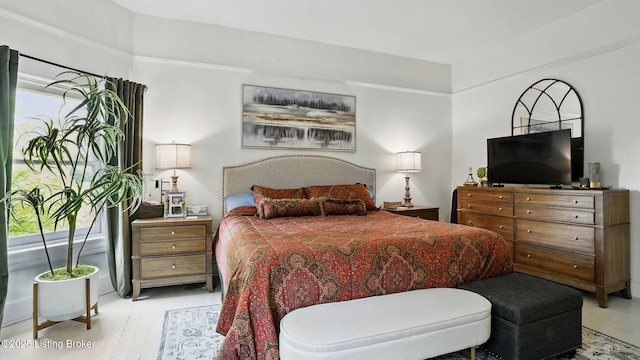 1212 S 2nd St, Louisville, KY 40203 - bedroom with wood finished floors and ornamental molding