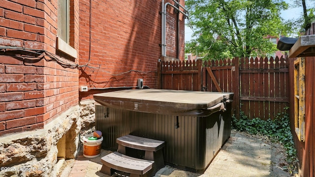 1212 S 2nd St, Louisville, KY 40203 - view of patio featuring a hot tub