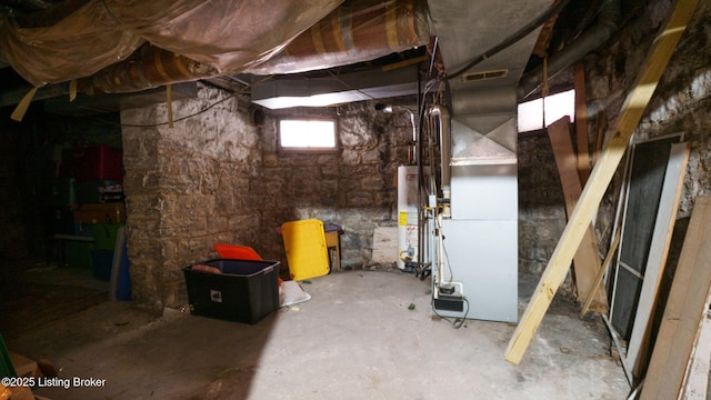 1212 S 2nd St, Louisville, KY 40203 - basement with gas water heater and heating unit