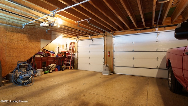1212 S 2nd St, Louisville, KY 40203 - garage featuring a garage door opener