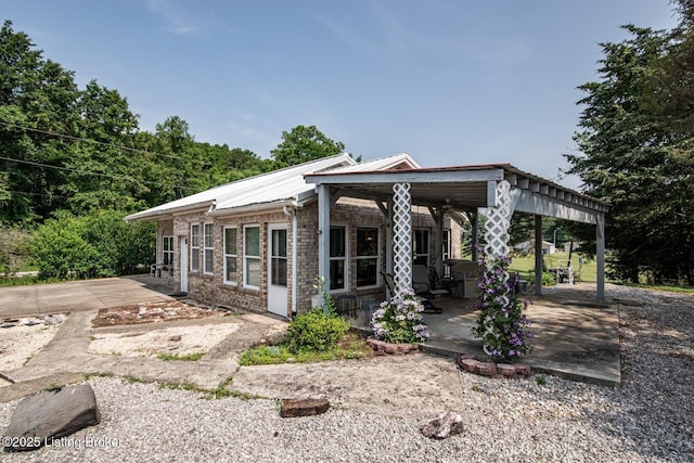 201 Wildflower Ln, Big Springs, KY 40175 - back of house with a patio area and brick siding