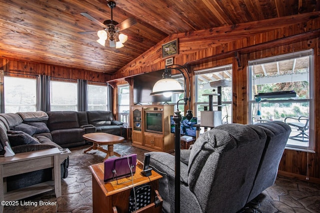 201 Wildflower Ln, Big Springs, KY 40175 - living area with wooden walls, wooden ceiling, lofted ceiling, plenty of natural light, and stone floors
