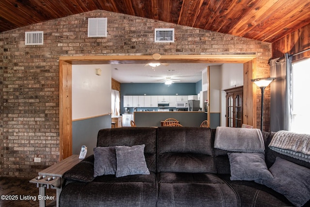 201 Wildflower Ln, Big Springs, KY 40175 - living room with vaulted ceiling, brick wall, a ceiling fan, and wooden ceiling