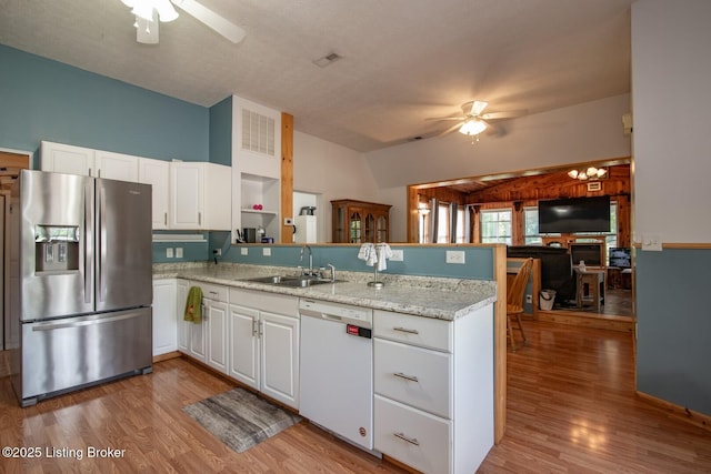201 Wildflower Ln, Big Springs, KY 40175 - kitchen featuring stainless steel refrigerator with ice dispenser, a ceiling fan, white dishwasher, a sink, and lofted ceiling