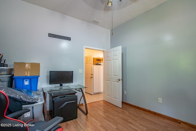 201 Wildflower Ln, Big Springs, KY 40175 - office space with ceiling fan, wood finished floors, baseboards, and a towering ceiling