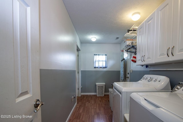 201 Wildflower Ln, Big Springs, KY 40175 - washroom with independent washer and dryer, cabinet space, dark wood-style floors, a textured ceiling, and baseboards