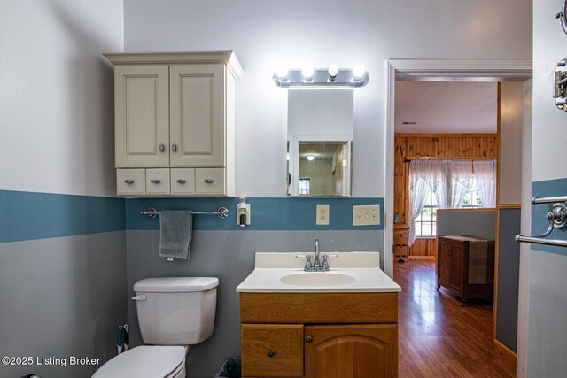 201 Wildflower Ln, Big Springs, KY 40175 - bathroom featuring vanity, toilet, and wood finished floors