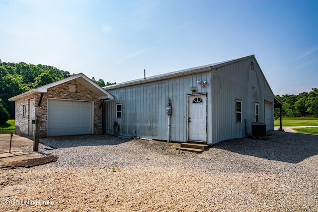201 Wildflower Ln, Big Springs, KY 40175 - view of front of house with a garage and an outbuilding