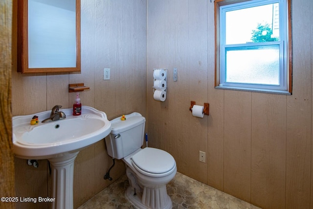 201 Wildflower Ln, Big Springs, KY 40175 - bathroom with toilet and wood walls