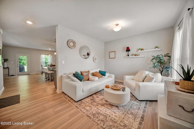 11915 Parkside Vista Ln, Louisville, KY 40229 - living room featuring light wood-type flooring and baseboards