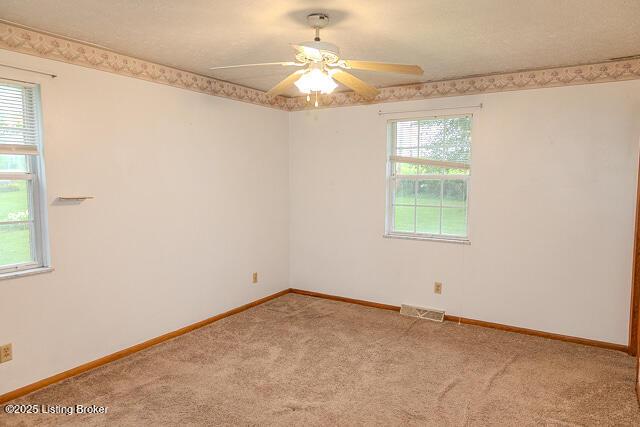 3110 Mount Lebanon Rd, Charlestown, IN 47111 - unfurnished room featuring carpet, ceiling fan, and baseboards