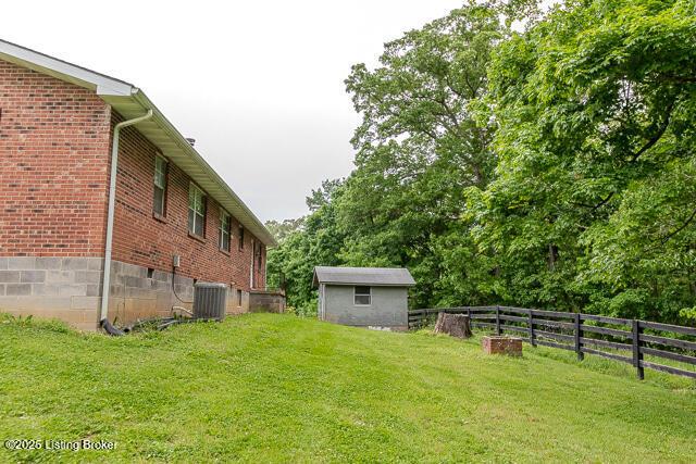 3110 Mount Lebanon Rd, Charlestown, IN 47111 - view of yard featuring cooling unit and an outbuilding