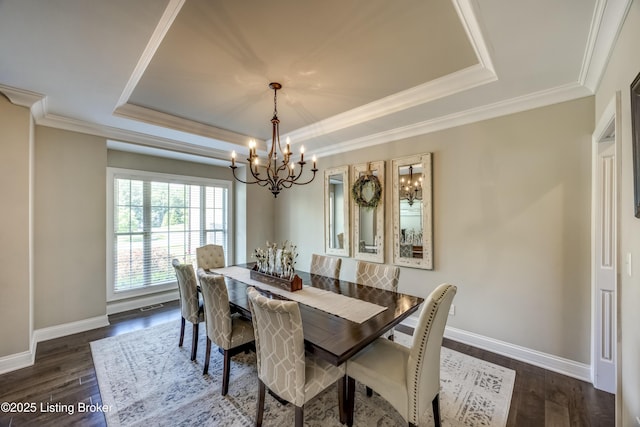 12406 Poplar Woods Dr, Goshen, KY 40026 - dining area featuring a tray ceiling, a chandelier, baseboards, dark wood-style flooring, and ornamental molding