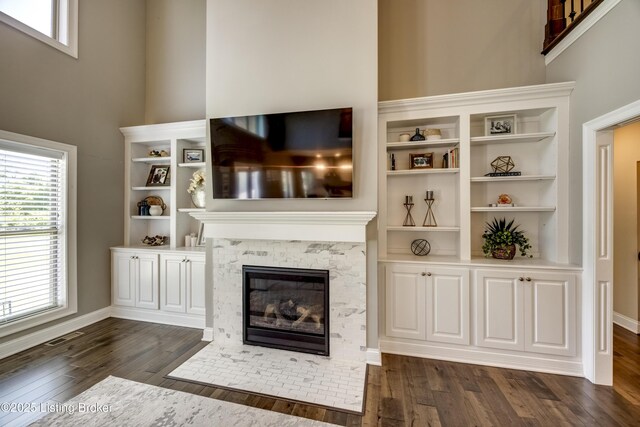 12406 Poplar Woods Dr, Goshen, KY 40026 - unfurnished living room featuring dark wood-style floors, a fireplace with flush hearth, and baseboards