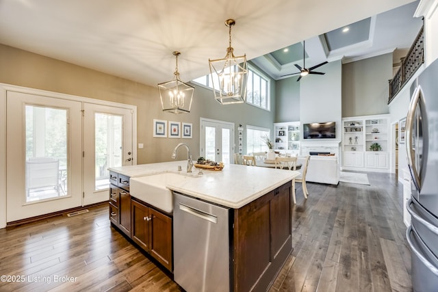 12406 Poplar Woods Dr, Goshen, KY 40026 - kitchen featuring stainless steel appliances, a sink, a high ceiling, french doors, and decorative light fixtures