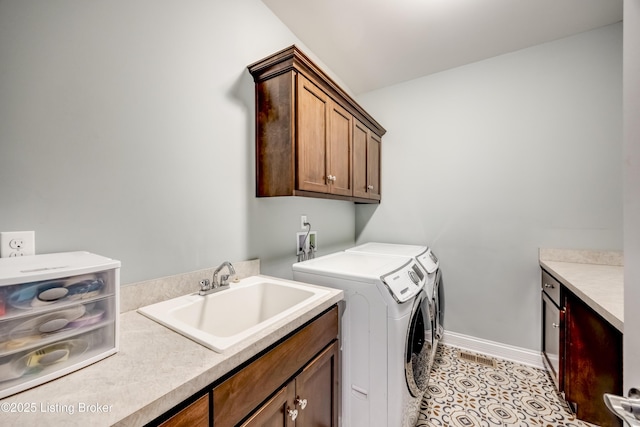 12406 Poplar Woods Dr, Goshen, KY 40026 - laundry room featuring separate washer and dryer, cabinet space, and baseboards