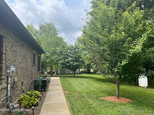 140 Ranch Ln, Loretto, KY 40037 - view of green lawn with central AC unit