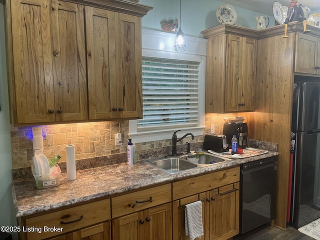 140 Ranch Ln, Loretto, KY 40037 - kitchen featuring black dishwasher, freestanding refrigerator, a sink, backsplash, and hanging light fixtures