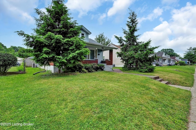 3707 Lentz Ave, Louisville, KY 40215 - view of property hidden behind natural elements featuring brick siding