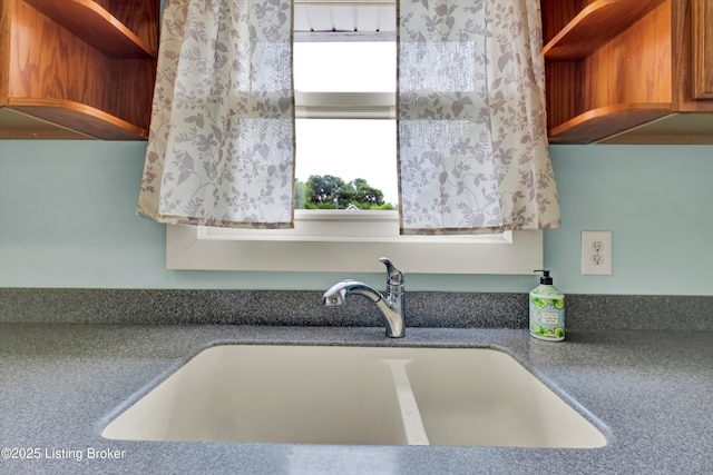 3707 Lentz Ave, Louisville, KY 40215 - detailed view of open shelves and a sink