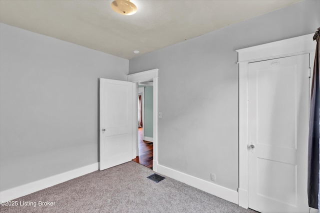 3707 Lentz Ave, Louisville, KY 40215 - unfurnished bedroom with carpet floors and baseboards