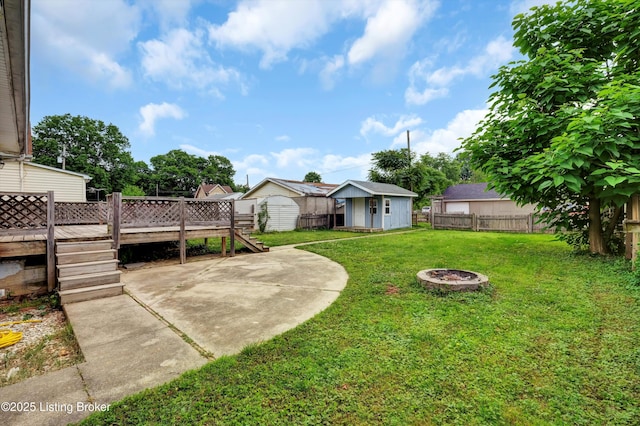 3707 Lentz Ave, Louisville, KY 40215 - view of yard with a wooden deck, a fire pit, a patio, and stairway